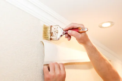 Pose de papier peint à Deux-Jumeaux — revêtements muraux et toiles de verre